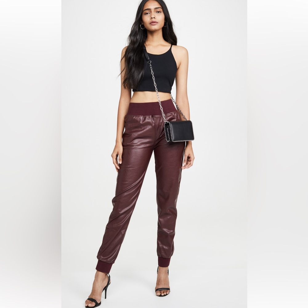 Kendall + Kylie Cobain Vegan Leather pants in burgundy.